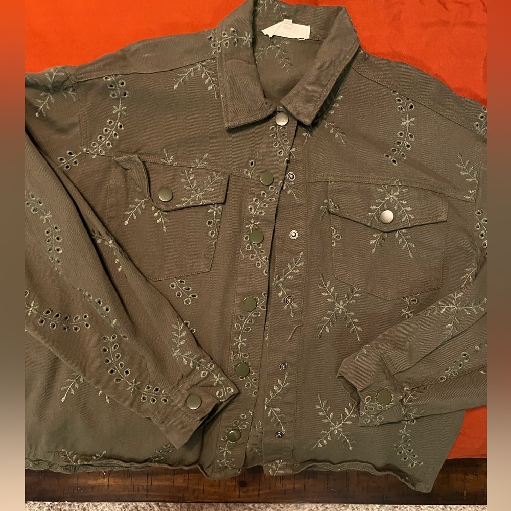 Snap button jacket green in color with cute flower design size‎ Medium